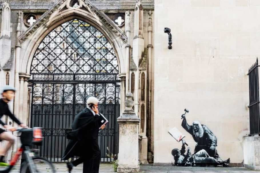 On September 8, 2025, Banksy revealed a new mural at London's Royal Courts of Justice depicting a judge striking a protester.